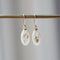 small sized mother of pearl drop earrings with gold barnacles