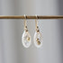 small sized mother of pearl drop earrings with gold barnacles