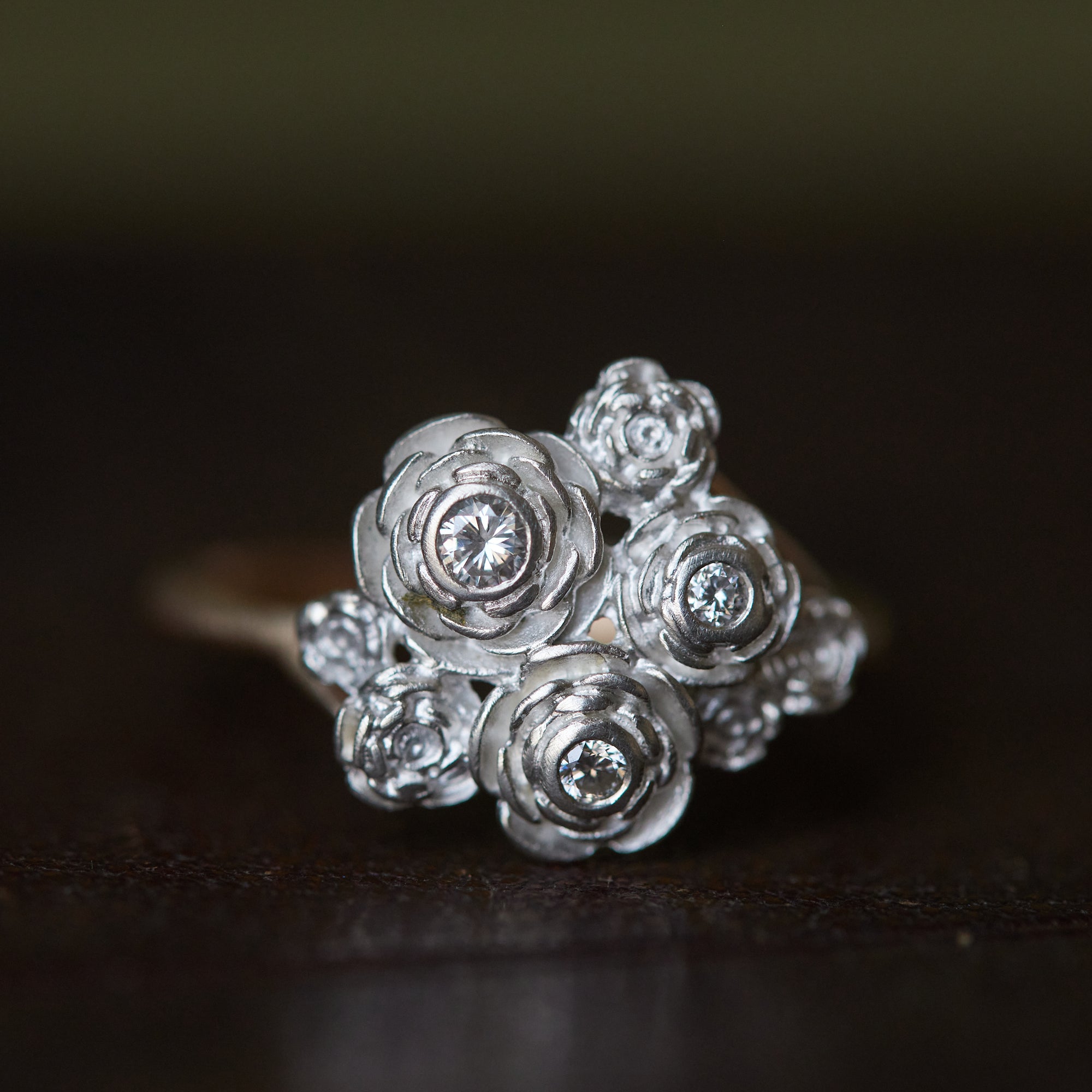 Diamond rose rings in gold and silver by Hannah Blount