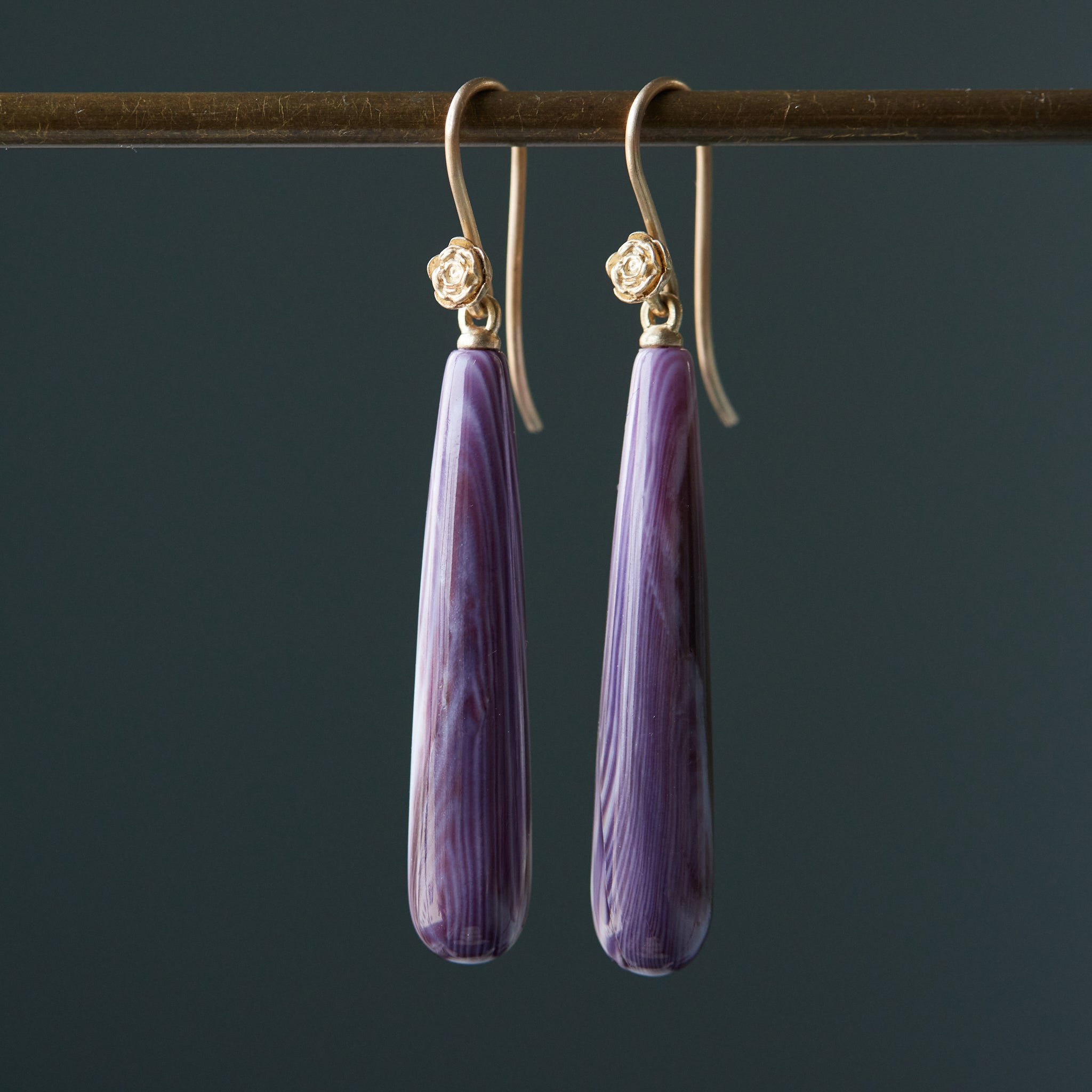 long purple quahog seashell drops set under gold rose ear wires