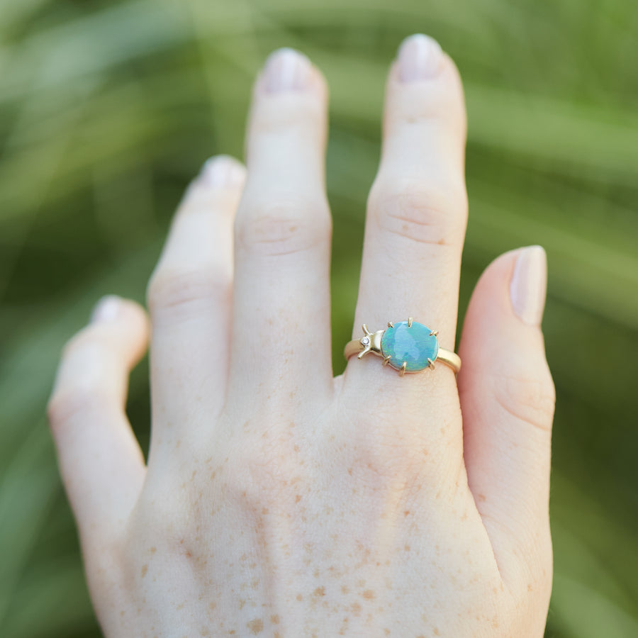 Lightning Ridge Opal Milkweed Beetle Vanity Ring on hand by Hannah Blount Jewelry
