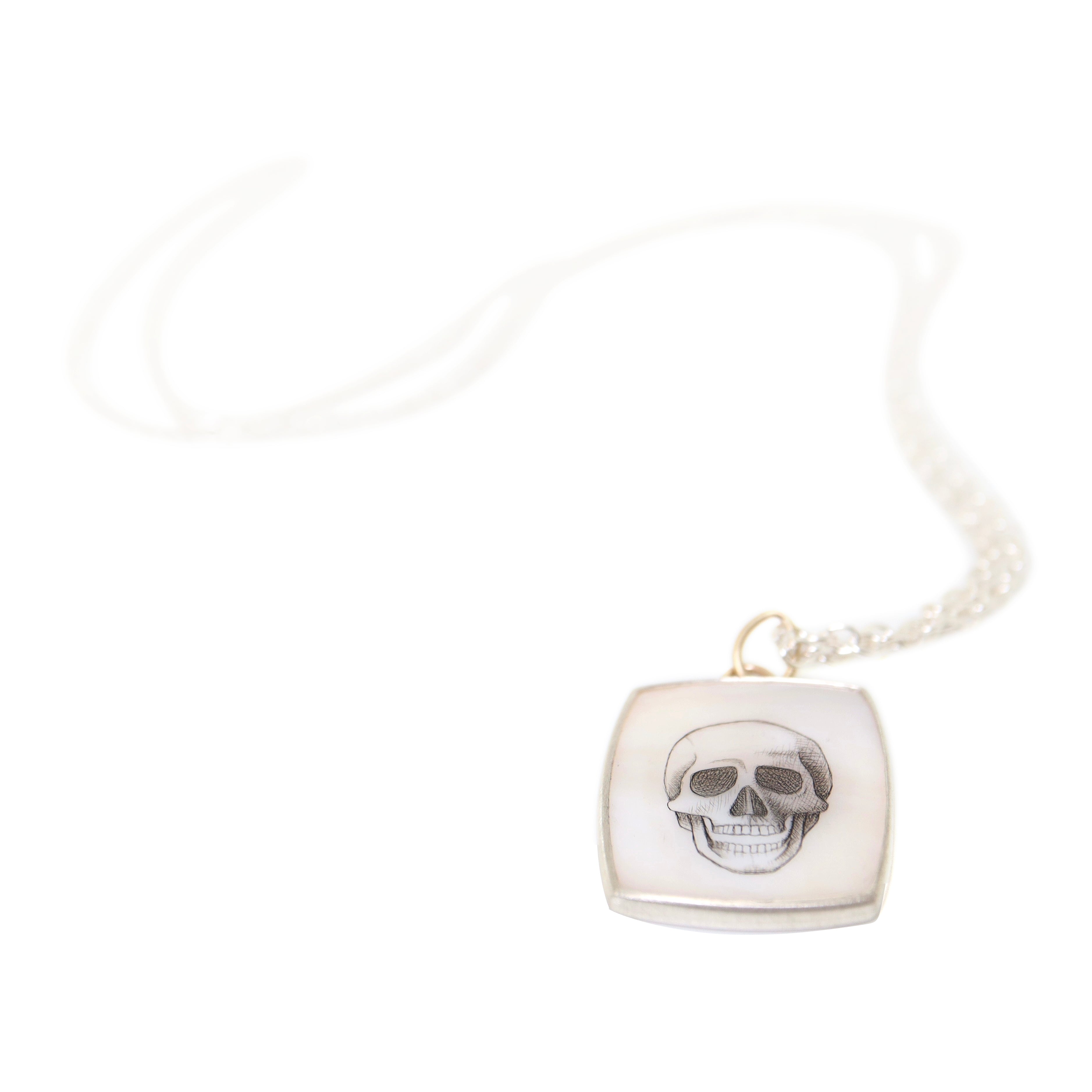 Skull scrimshaw on mother of pearl - necklace