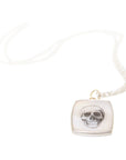 Skull scrimshaw on mother of pearl - necklace