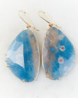 Blue pansy butterfly paraiba in quartz earrings with prongs by hannah blount jewelry