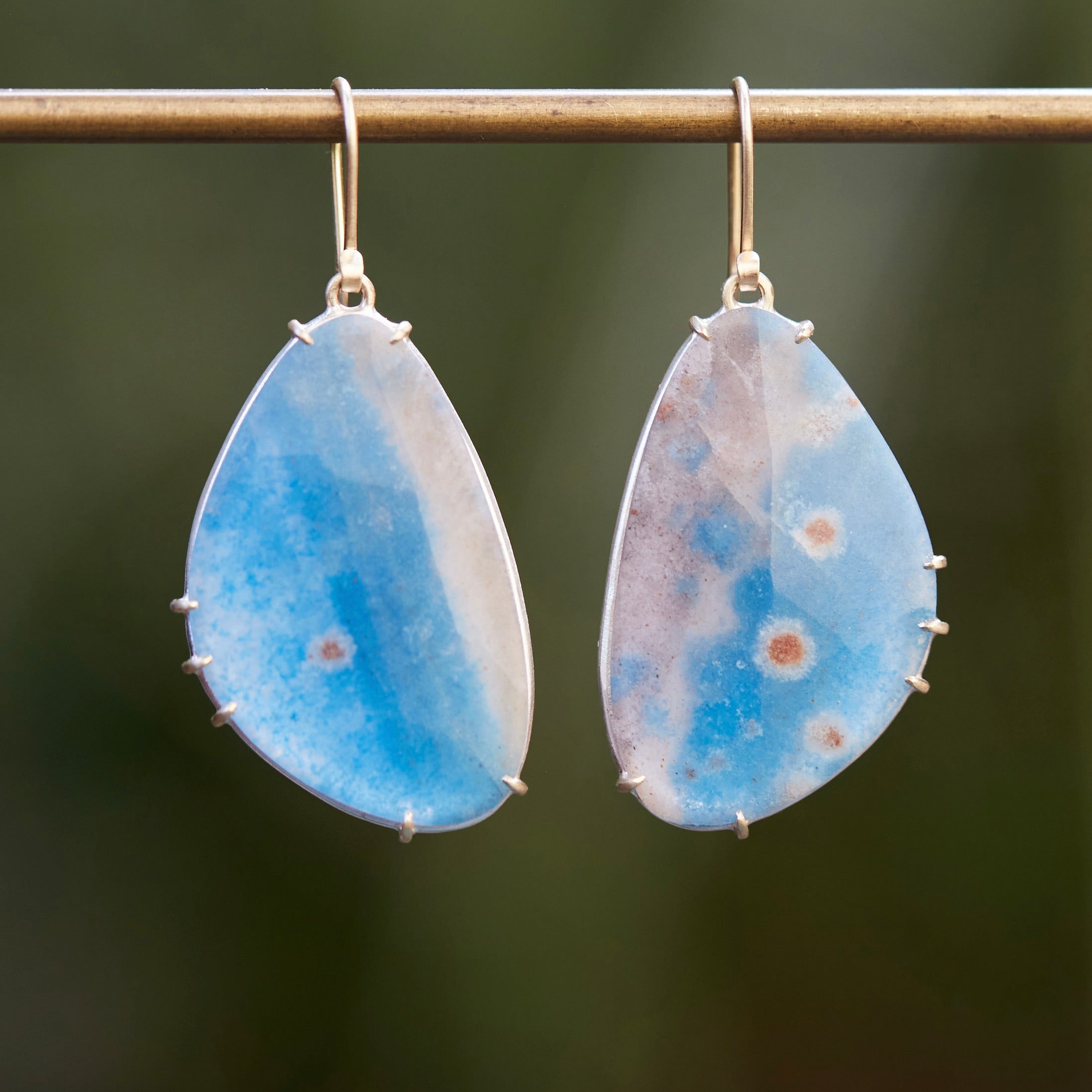 Blue pansy butterfly paraiba in quartz earrings with prongs by hannah blount jewelry
