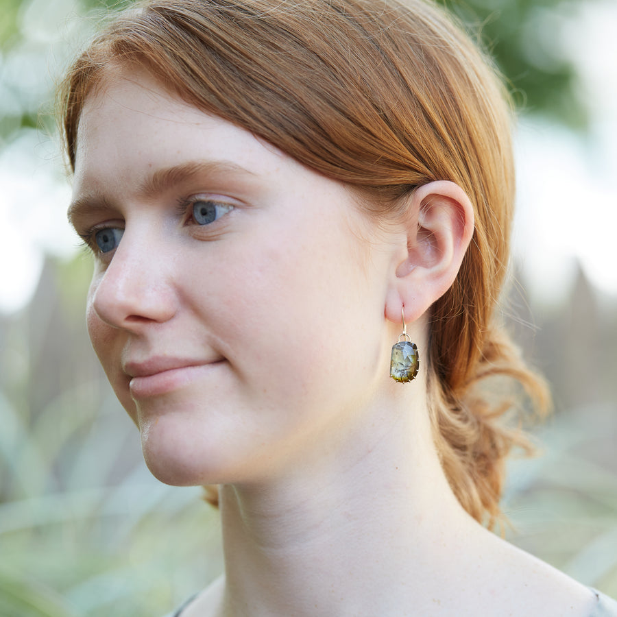 whiskey tourmaline chrysalis earrings with prongs on person by hannah blount jewelry