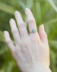 Lightning Ridge Opal Beetle Ring on person by Hannah Blount