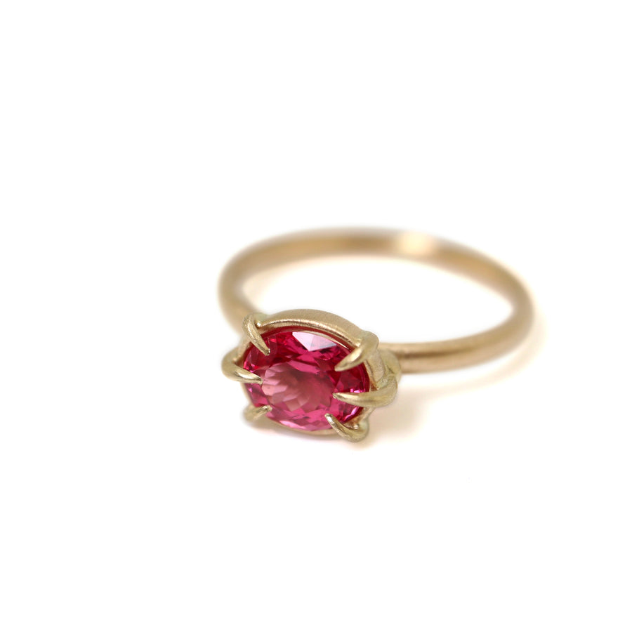 Barbie pink spinel ring in gold with prongs, side view, by hannah blount