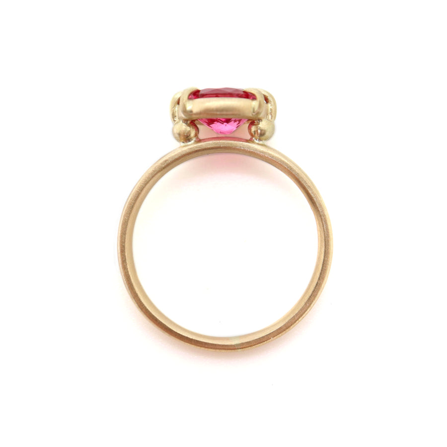 Barbie pink spinel ring in gold with prongs, side view, by hannah blount
