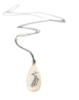Codfish and school of fish scrimshaw on mother of pearl - necklace