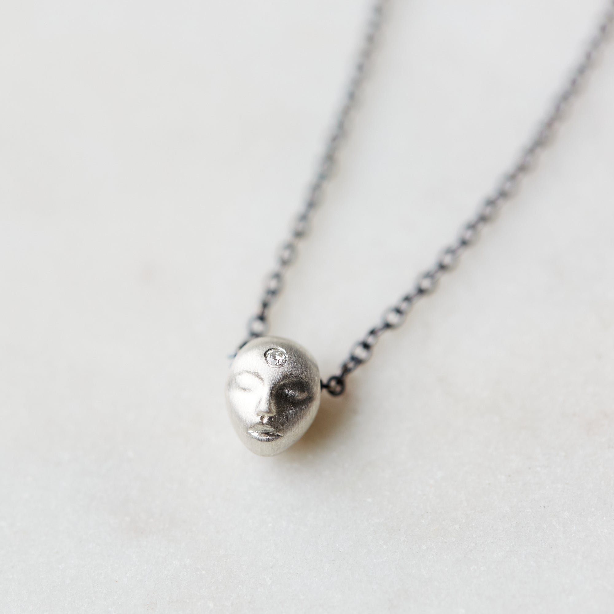 Little cameo silver necklace with diamond by Hannah Blount
