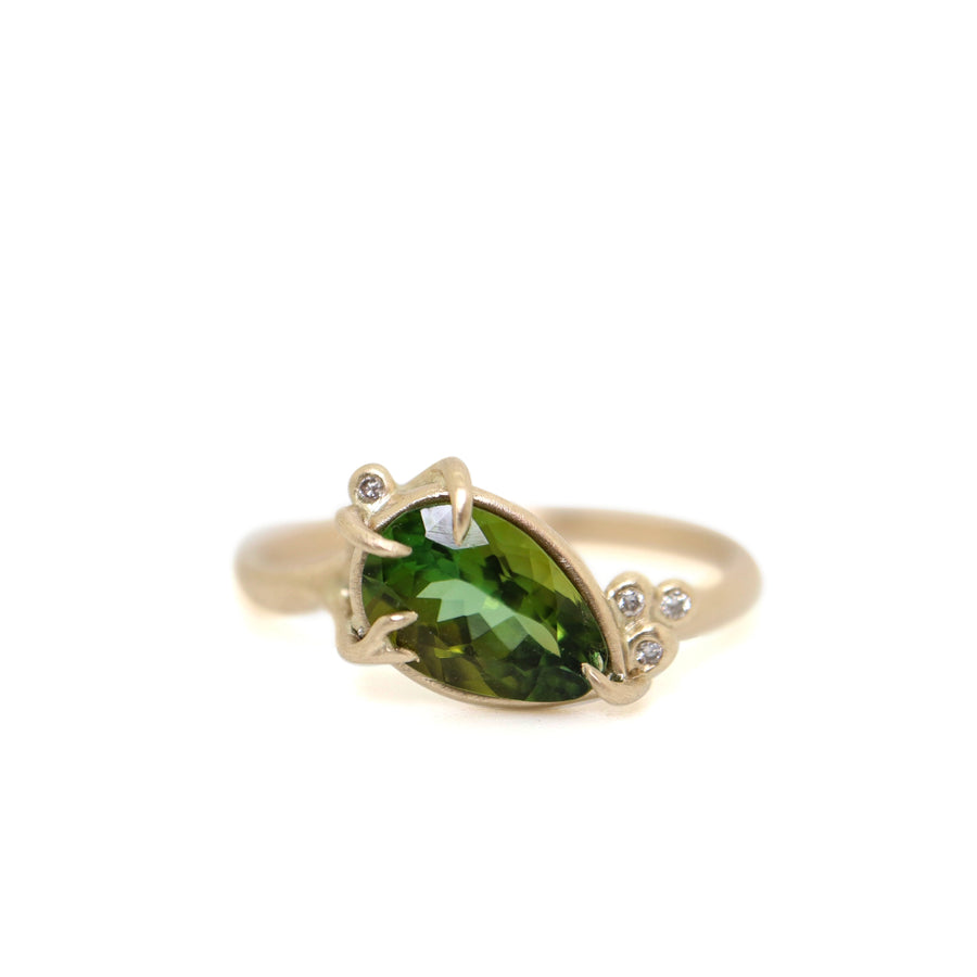 Green tourmaline gold ring with diamond berries by Hannah Blount