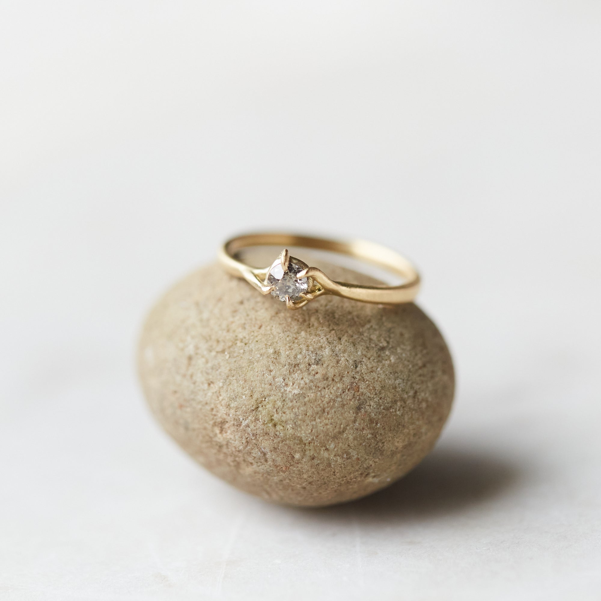 little salt and pepper diamond ring set in gold branches. by hannah blount