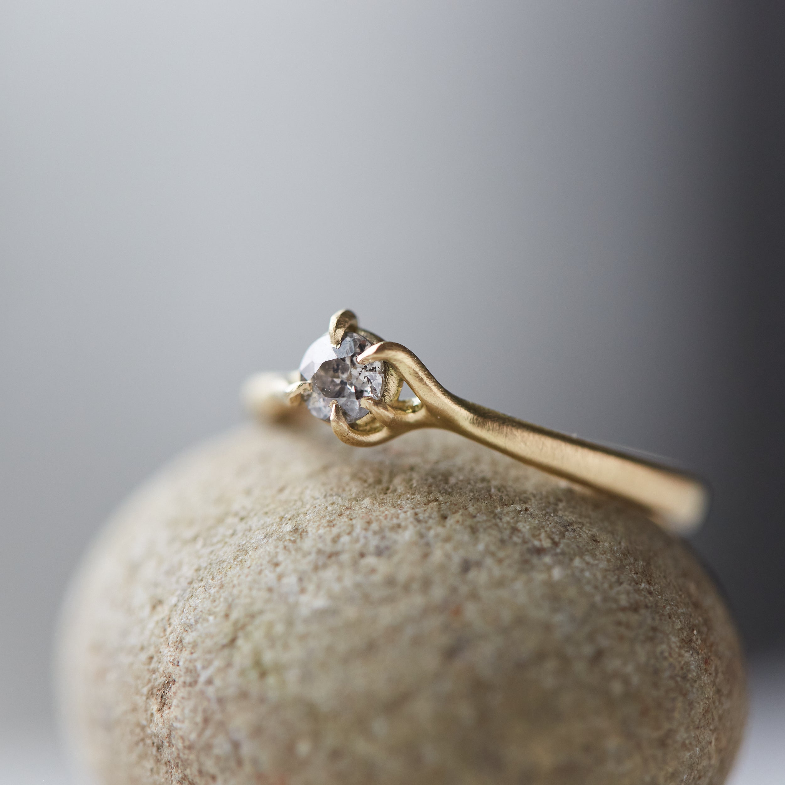 little salt and pepper diamond ring set in gold branches. by hannah blount