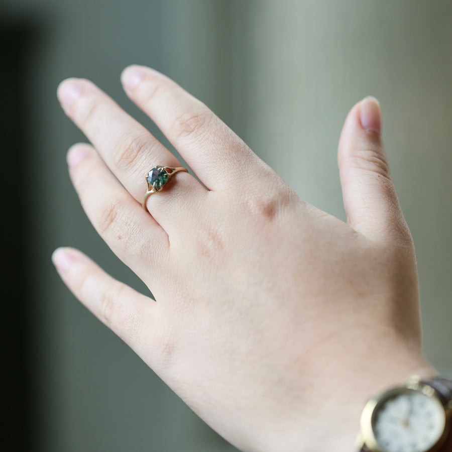 green agate stone set in gold branch ring shown on middle finger