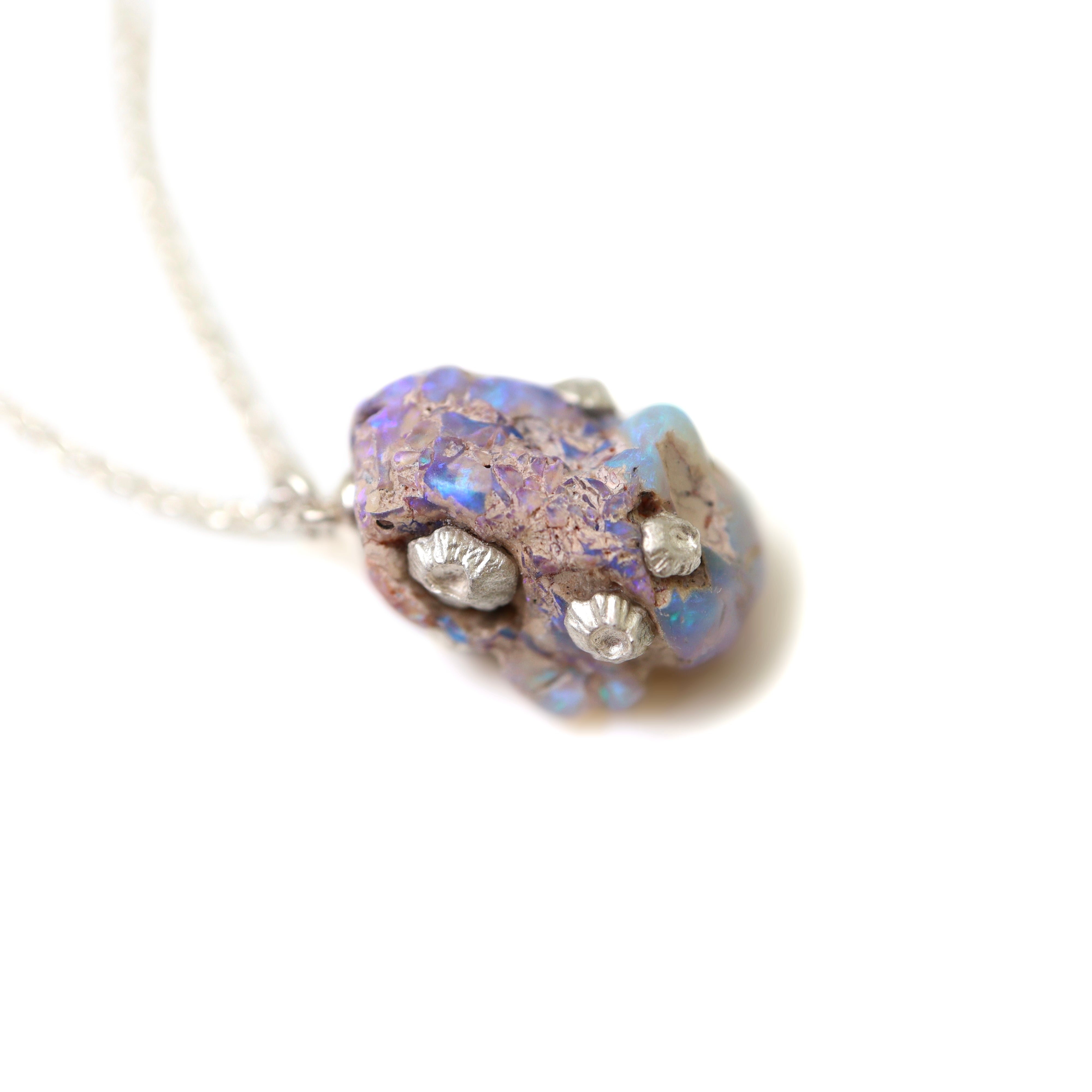 Raw opal silver necklace with barnacles by Hannah Blount