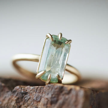 Emerald ring with gold prongs