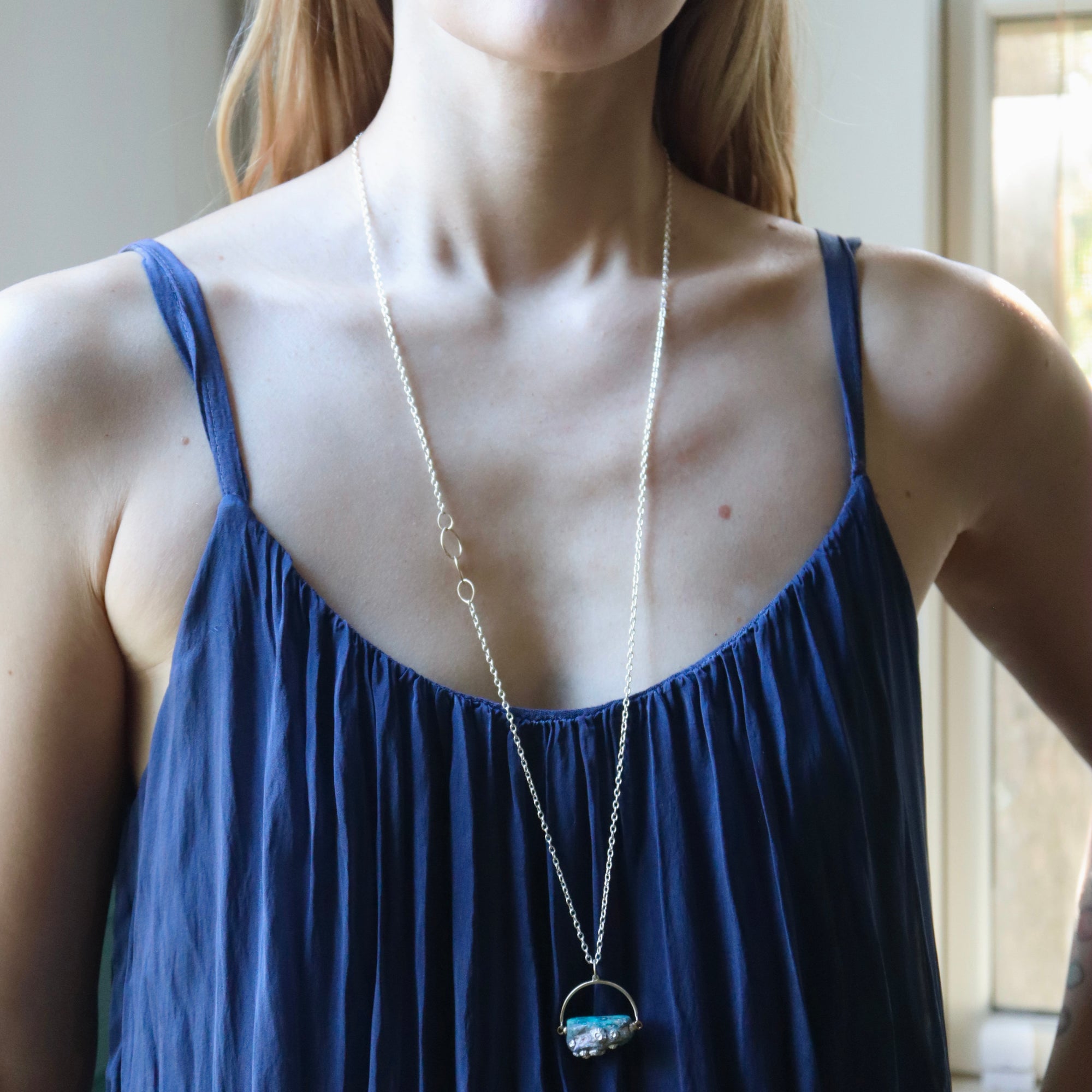 Raw opal necklace with silver barnacles by Hannah Blount