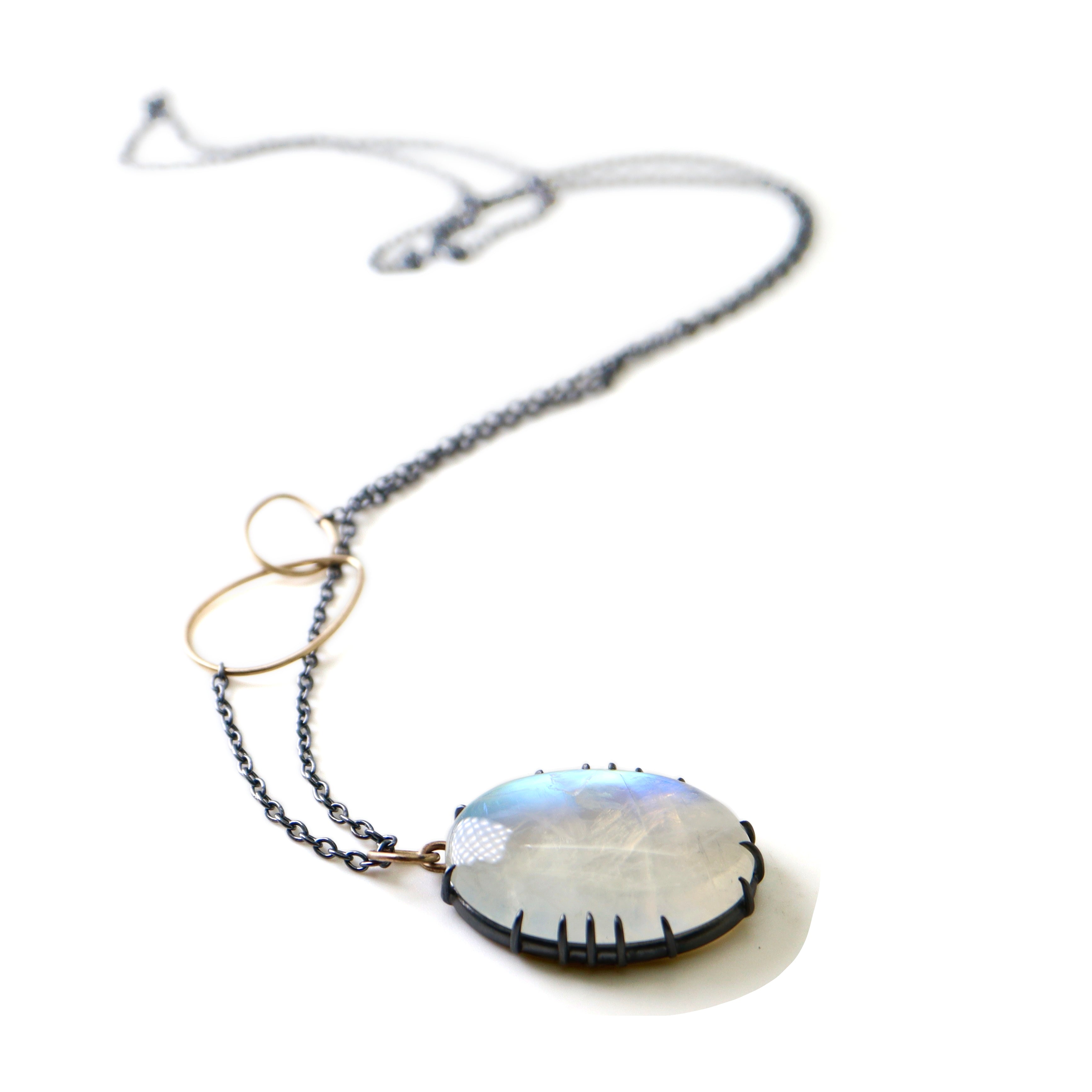 rainbow moonstone necklace with oxidized silver prongs by hannah blount
