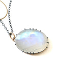 detail of rainbow moonstone necklace with oxidized silver prongs by hannah blount