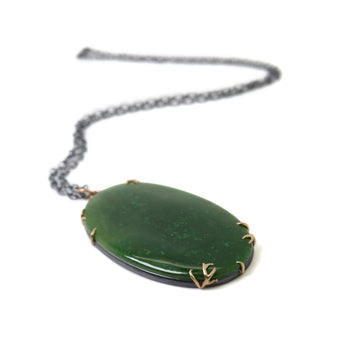 grand green nephrite jade oval cabochon set in gold branch prongs necklace