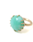 side view of green chrysoprase ring with gold prongs by hannah blount
