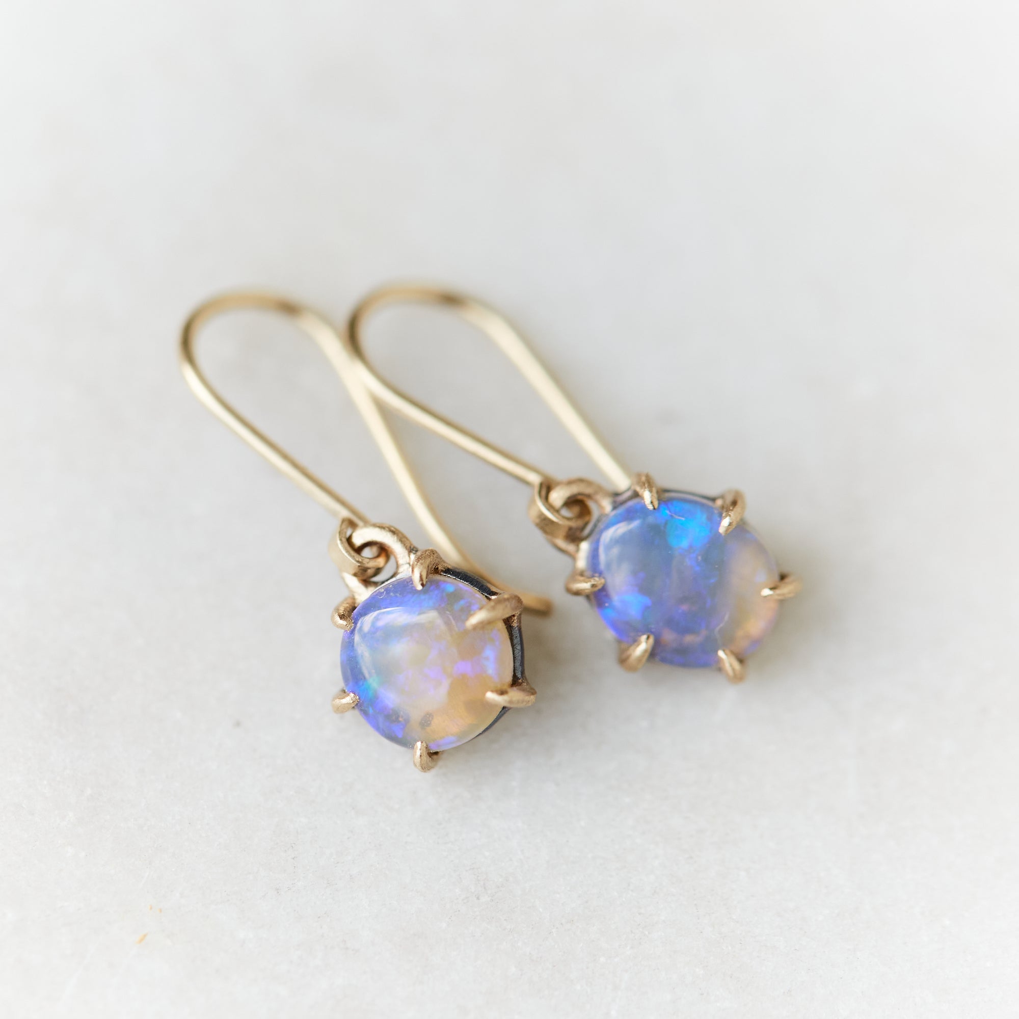 Opal gold earrings by Hannah Blount
