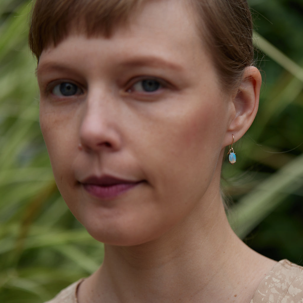 Coober Pedy opal dangle earrings in gold by Hannah Blount