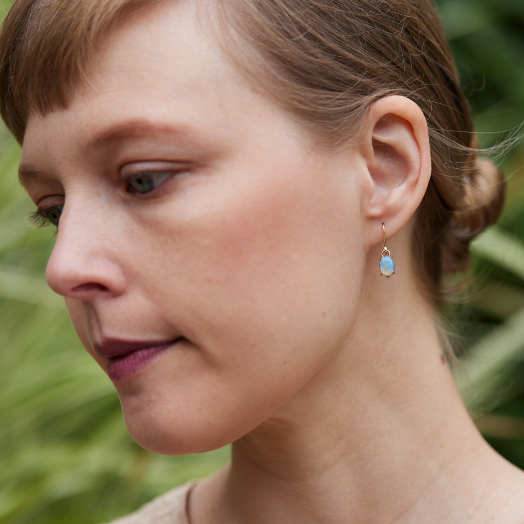 Coober Pedy opal dangle earrings in gold by Hannah Blount