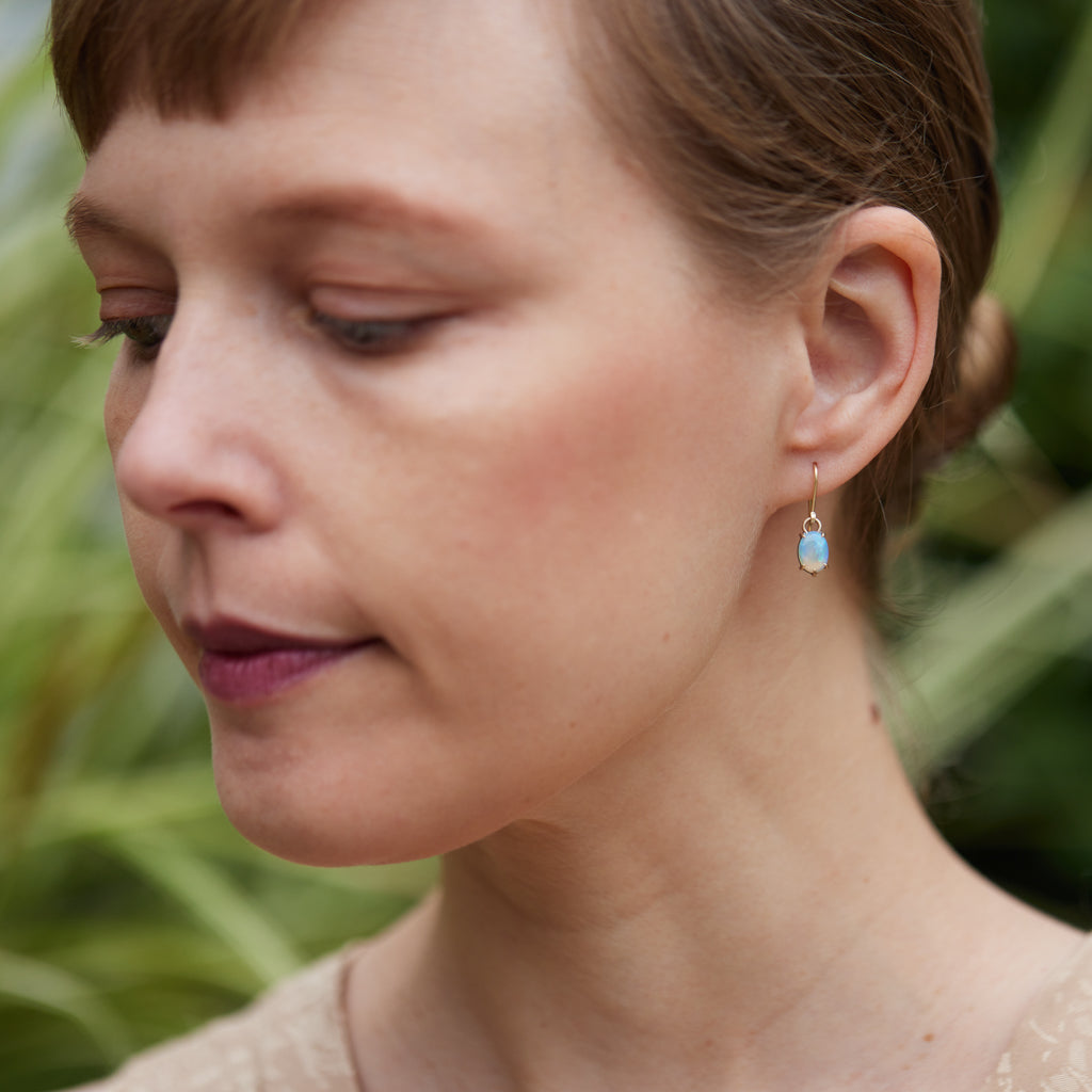 Coober Pedy opal dangle earrings in gold by Hannah Blount
