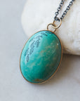 School of fish scrimshaw on Kingman turquoise - necklace