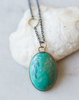 School of fish scrimshaw on Kingman turquoise - necklace