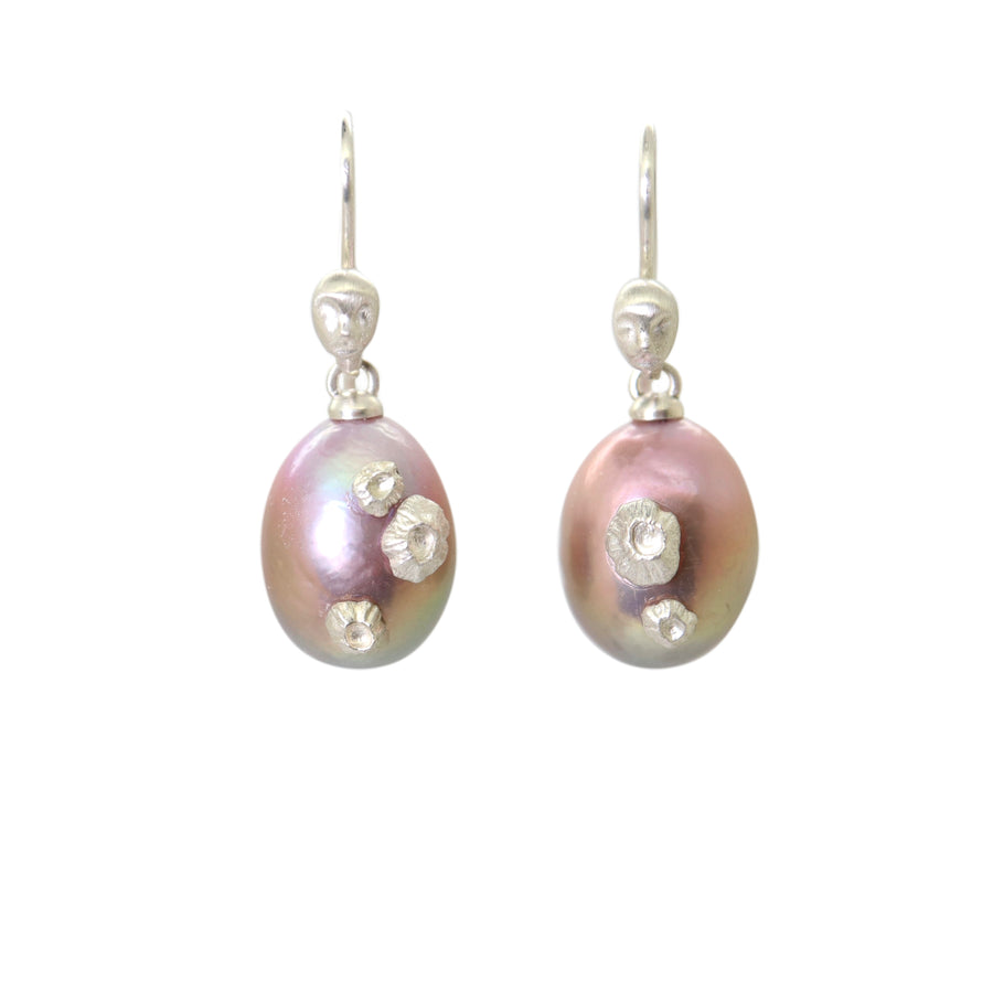 lavender pink pearl earrings with silver barnacles and silver cameo ear wires with faces, by hannah blount