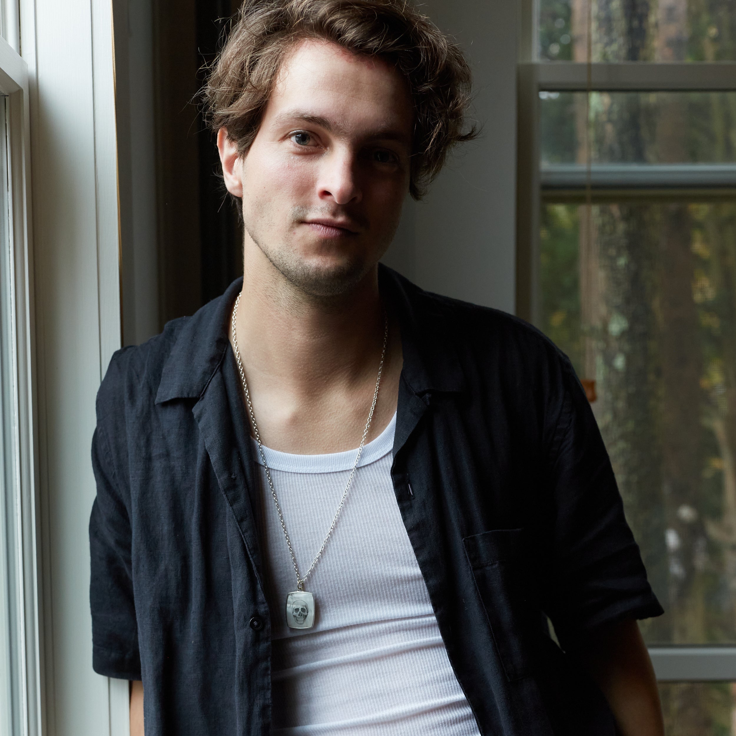 Skull scrimshaw on mother of pearl - necklace