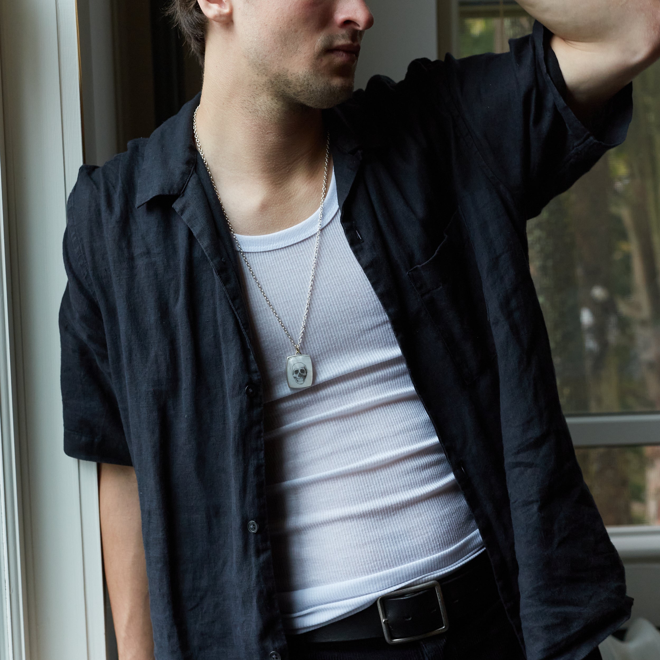 Skull scrimshaw on mother of pearl - necklace