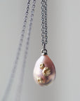 pink baroque freshwater pearl necklace with gold barnacles by hannah blount jewelry