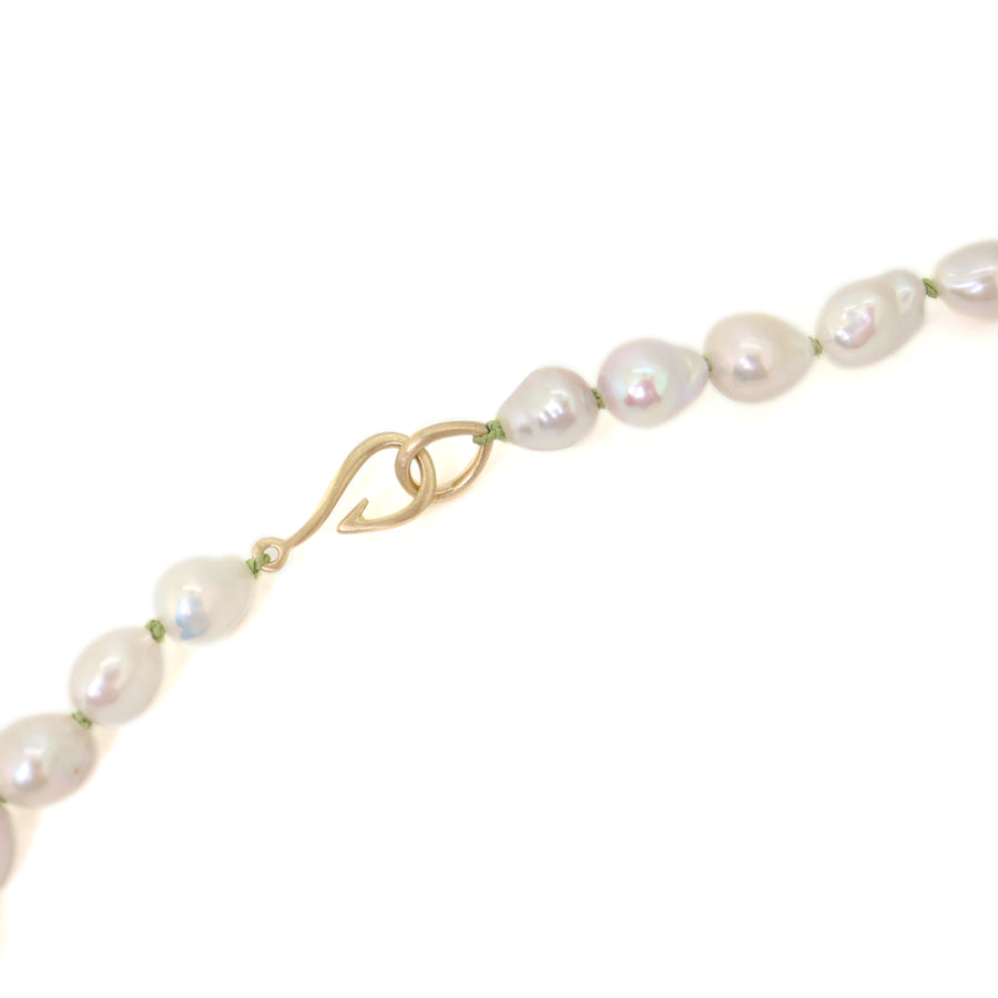 Baroque white freshwater pearl Ruthie B. necklace with aloe-hued silk and gold clasp by Hannah Blount