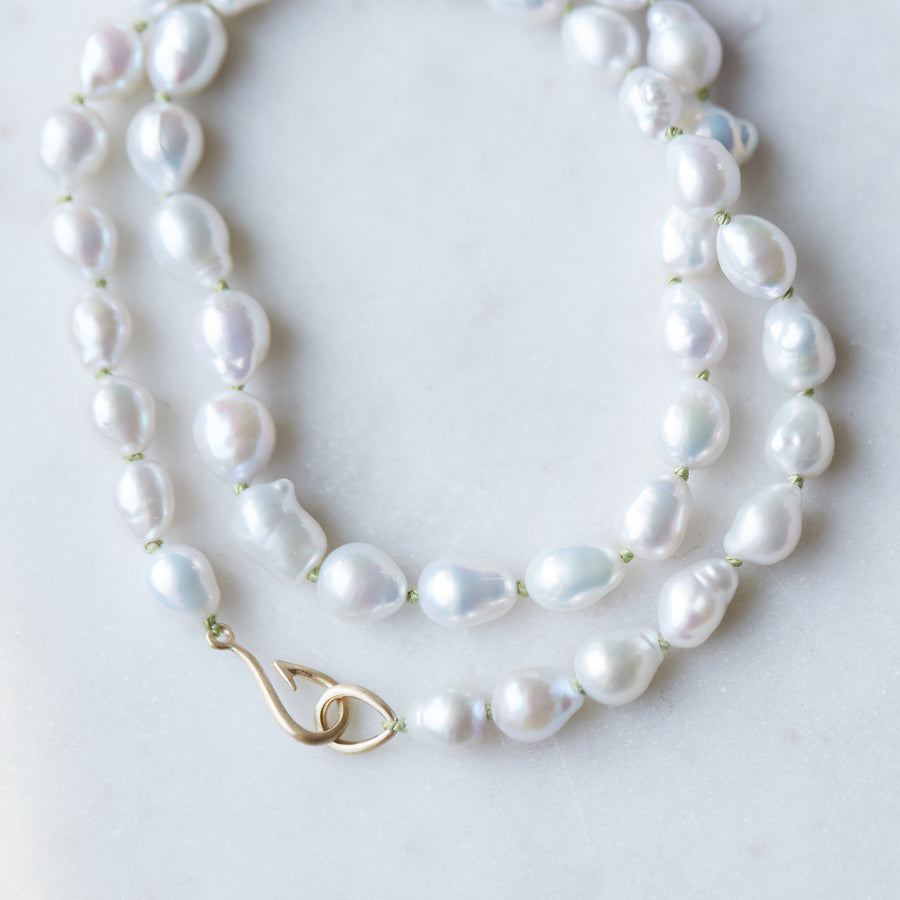 Baroque white freshwater pearl Ruthie B. necklace with aloe-hued silk and gold clasp by Hannah Blount