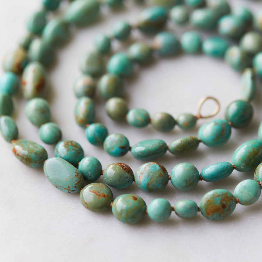 Kingman turquoise double-strand necklace with burnt sienna-hued silk and gold clasp by Hannah Blount