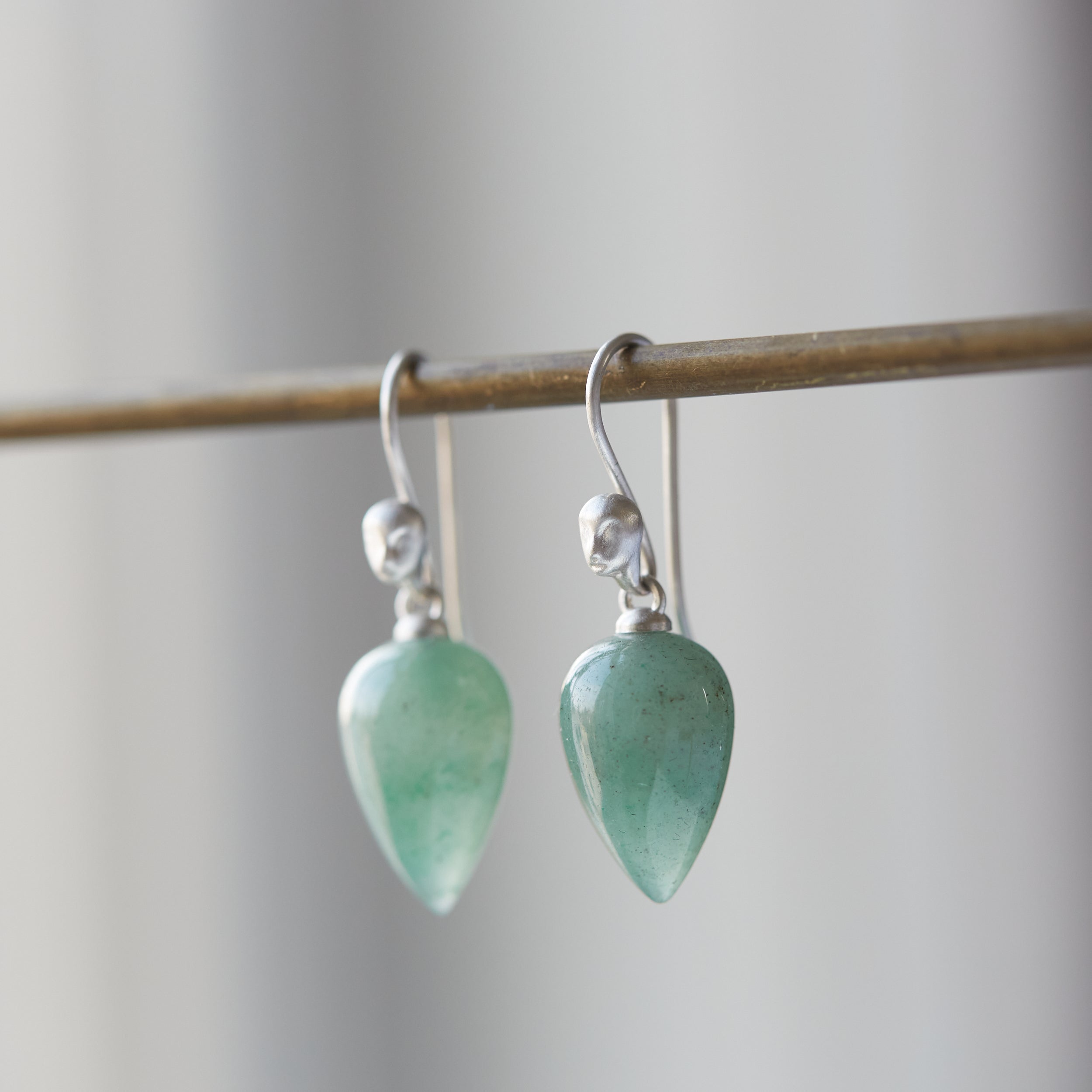 Green aventurine cameo earrings by Hannah Blount