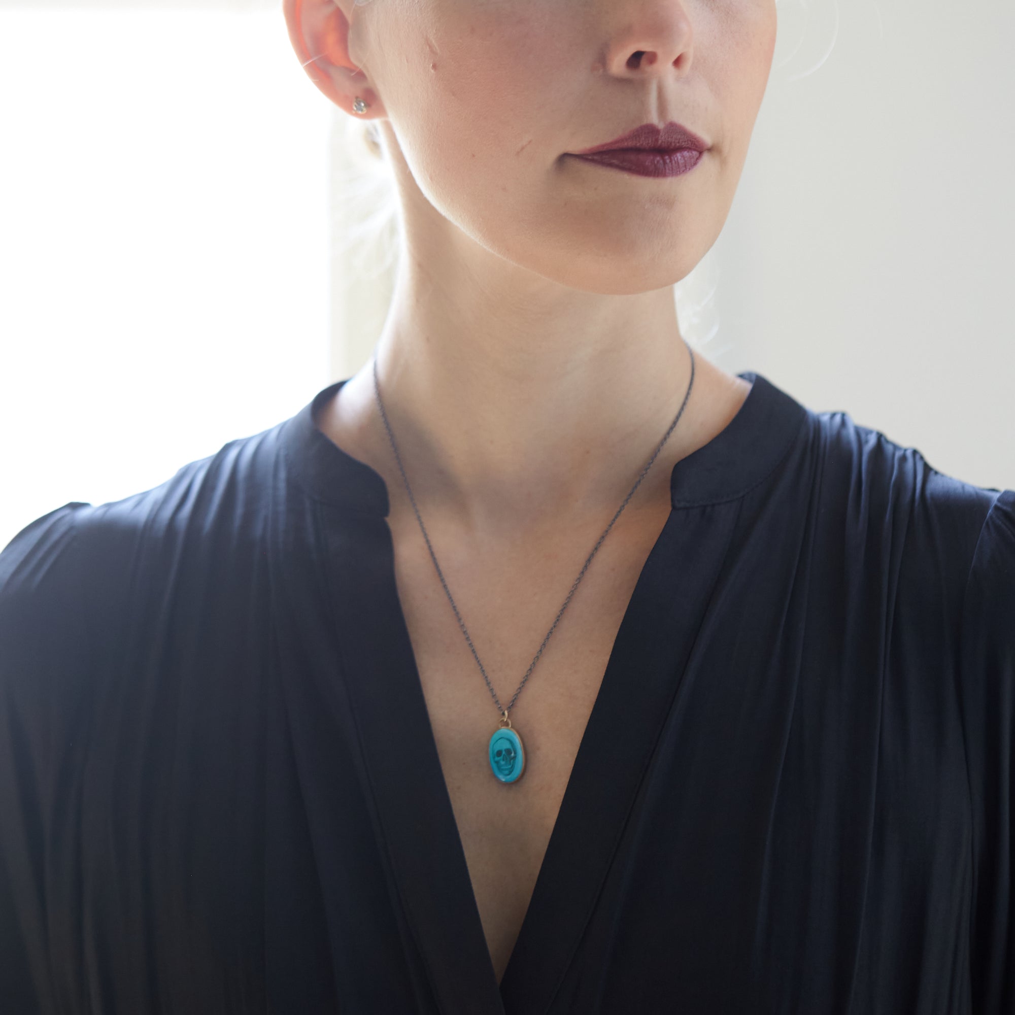 Skull scrimshaw on Kingman turquoise - necklace