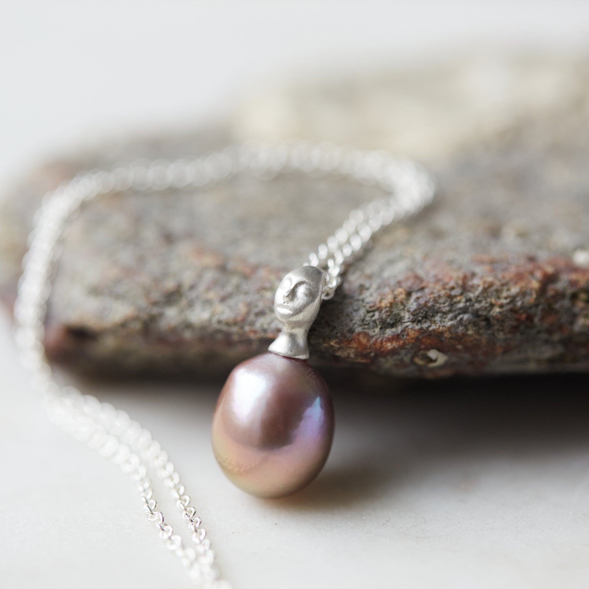 pink freshwater baroque pearl necklace with cameo lady face bail in silver by hannah blount jewelry
