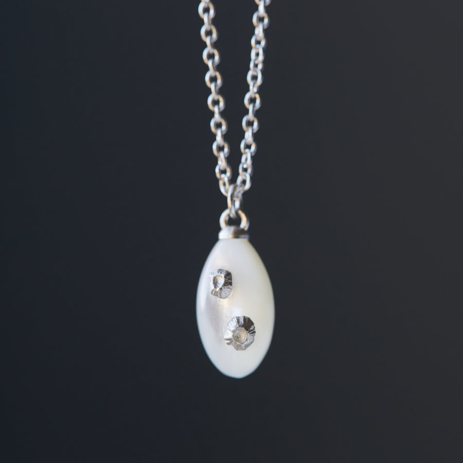 Little mother of pearl necklace with silver barnacles by Hannah Blount