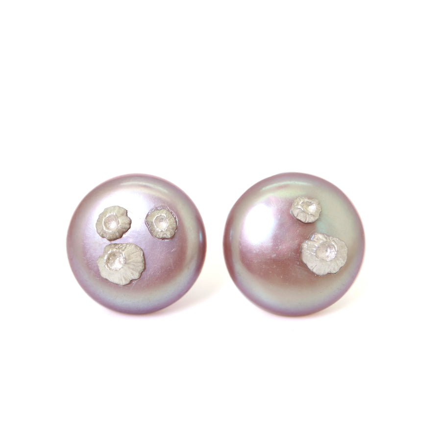 large pink freshwater button pearl studs with silver barnacles by hannah blount jewelry