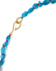 Raw Kingman turquoise necklace with coral-hued silk and gold clasp by Hannah Blount