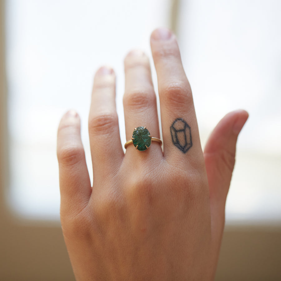 Carved emerald vanity ring by Hannah Blount