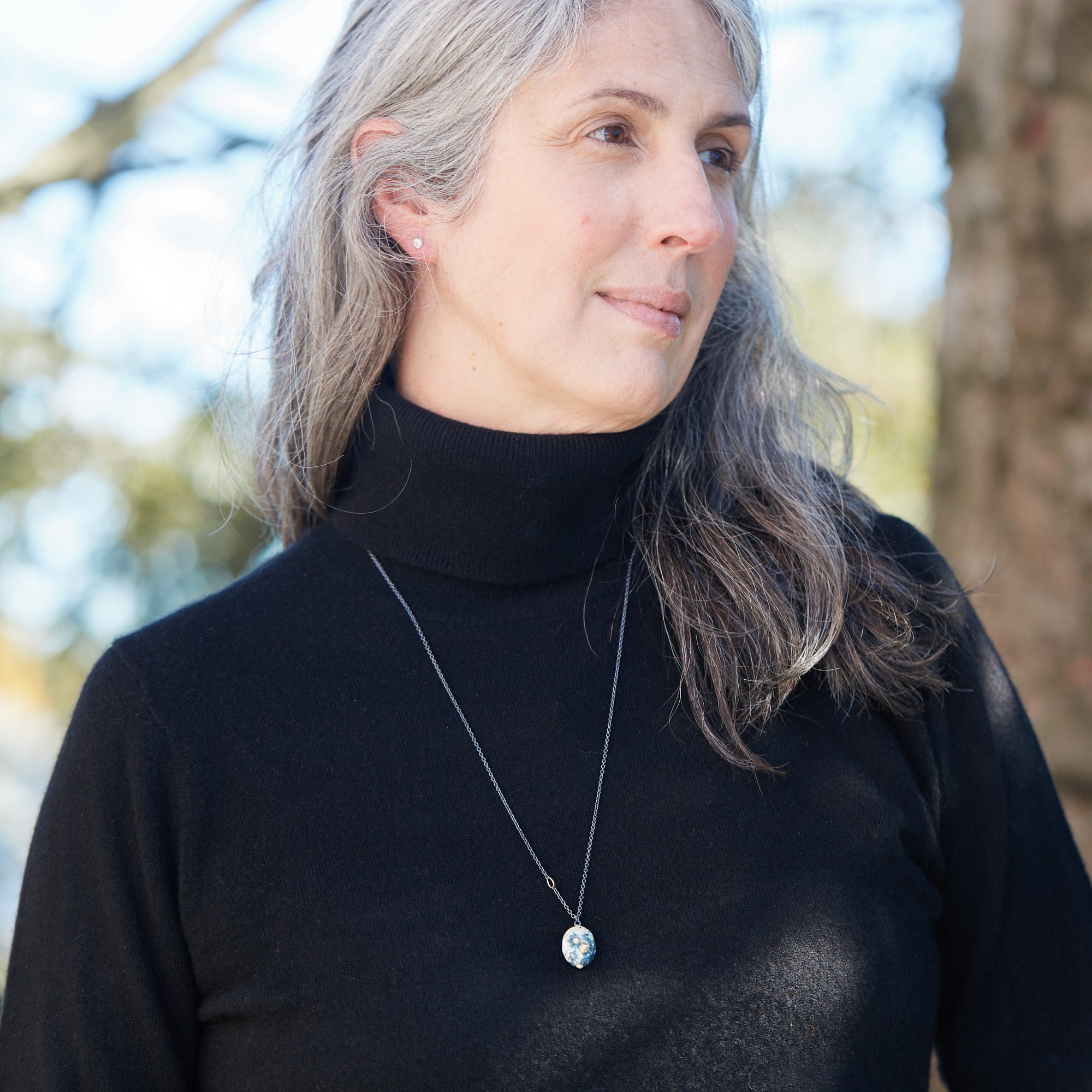 Opal necklace with gold barnacles by Hannah Blount