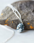 Opal necklace with silver barnacles by Hannah Blount