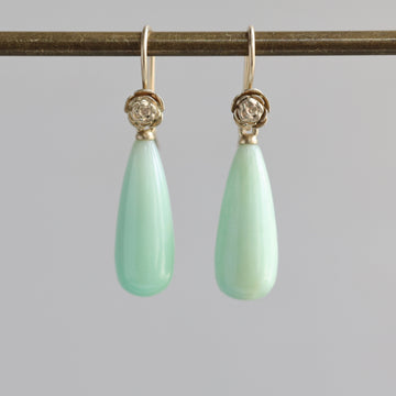 Teardrop shaped chrysoprase earrings with 14k yellow gold rose accents and ear wires. 