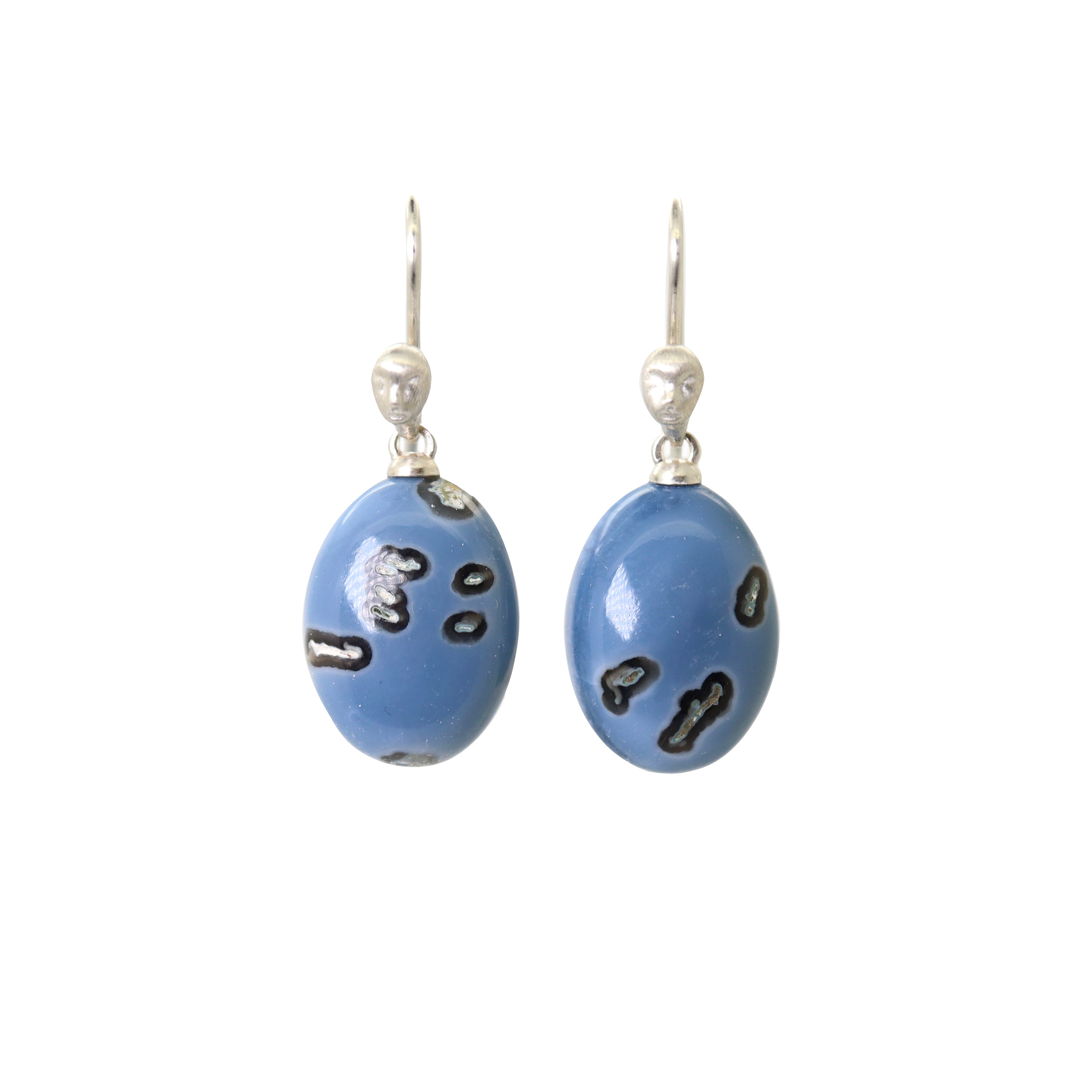 mottled blue common opal oval drops set as earrings with ear wires featuring silver Lady faces